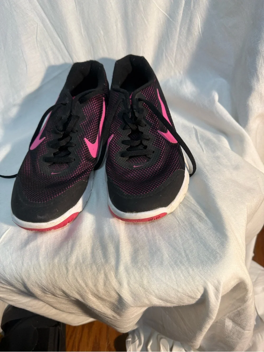 Nike Women’s Black and Pink Mesh Running Sneakers
